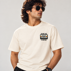 Front of off-white cassette T-shirt worn by a man, with small chest graphic reading I'm Not Old, I'm Retro around a mixtape.