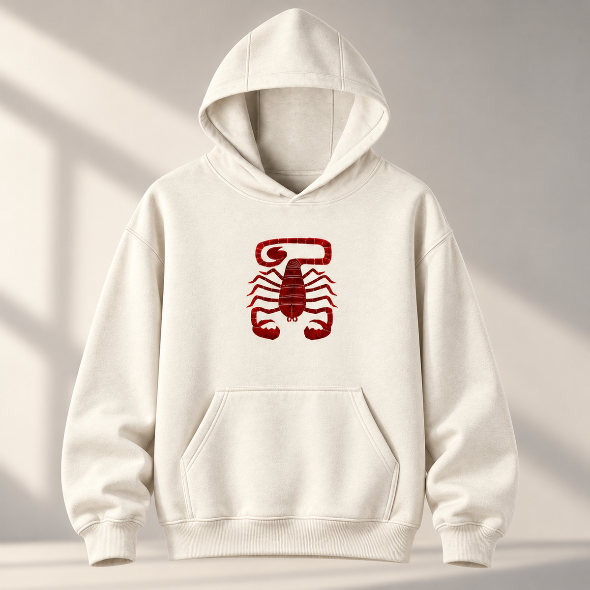 Off-white Scorpio pullover hoodie front view with burgundy scorpion graphic, hood and kangaroo pocket.