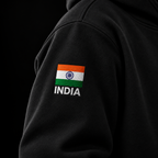 Black Army hoodie sleeve close-up showing the Indian flag patch and INDIA embroidery.
