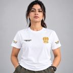 Woman wearing a white India Pride T-shirt with gold chest emblem, TeeHaus logo and tricolor sleeve prints.