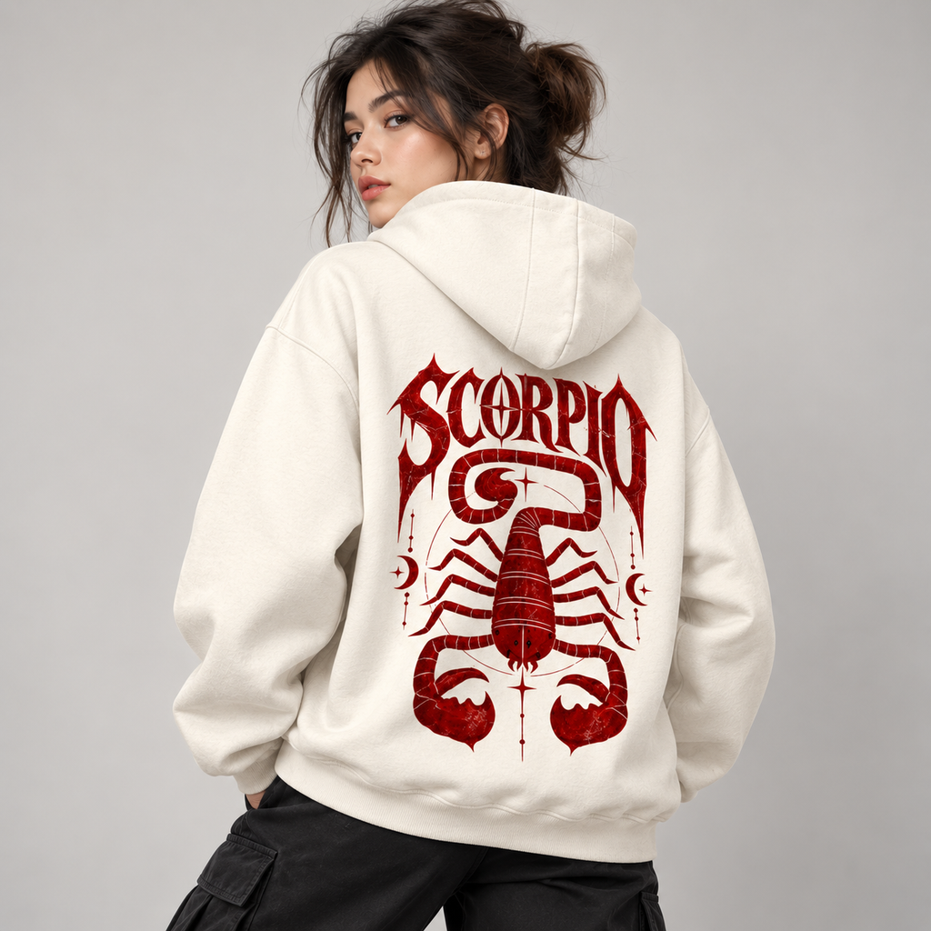 Woman modeling the back of an off-white Scorpio hoodie with bold burgundy SCORPIO lettering and scorpion illustration.